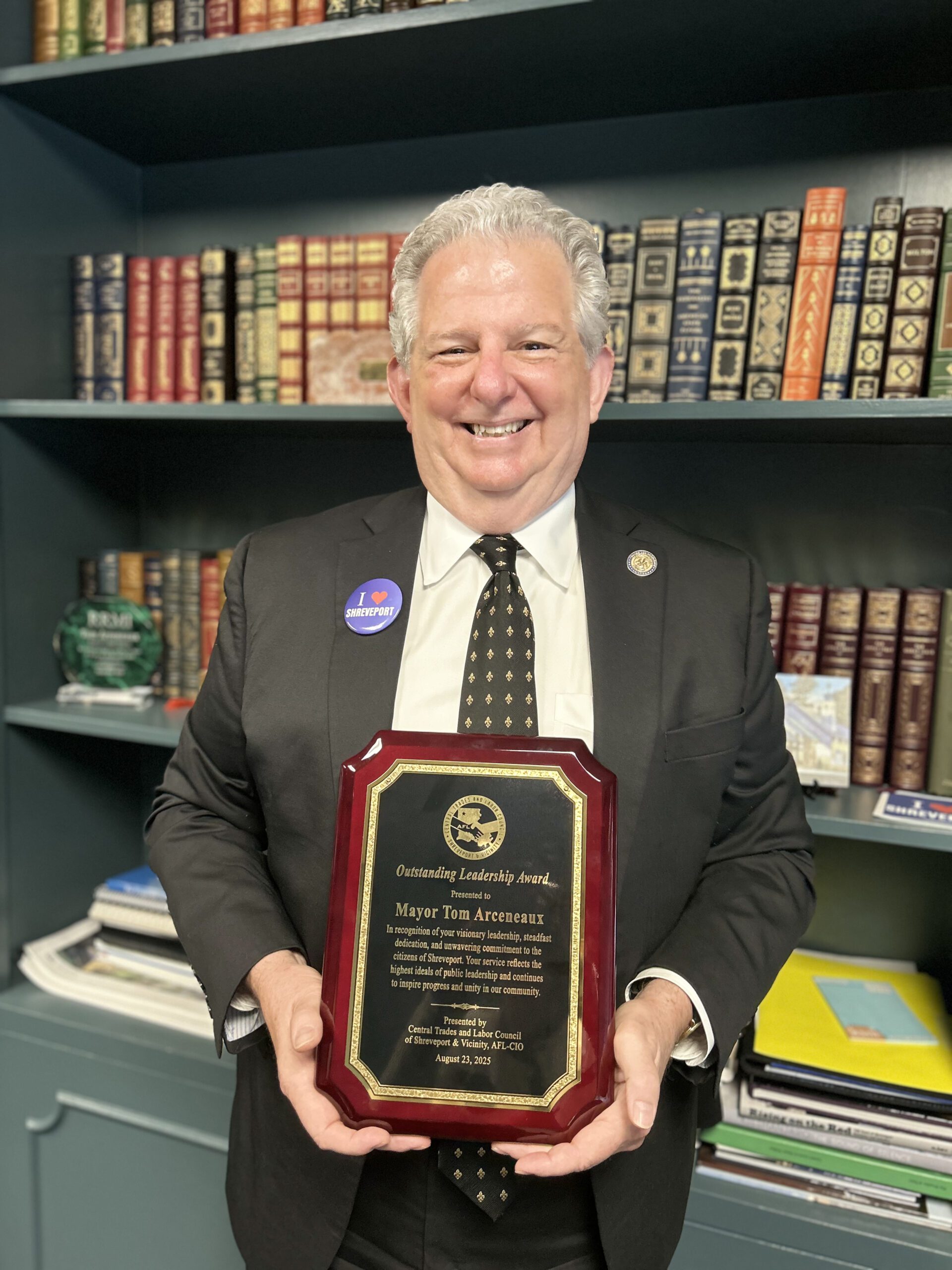 Mayor with award